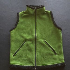 Warm 100% polyester vest. Machine washable.
